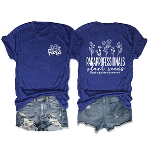 Detail of navy blue t-shirt with floral print and distressed denim shorts set