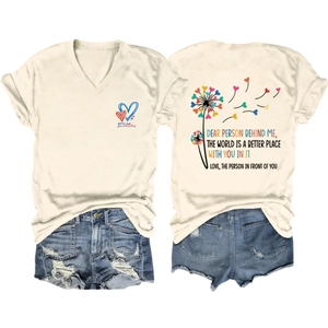 Detail of inspirational back print on beige V-neck t-shirt with denim shorts set