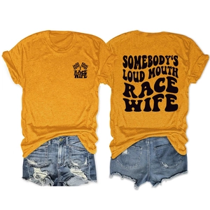 Flat lay of yellow Race Wife T-shirt and distressed denim shorts showing front and back