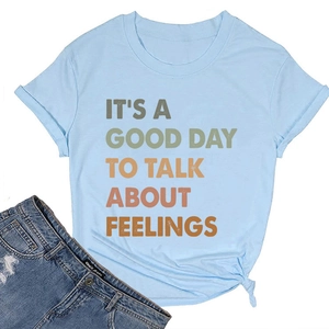 Detail of light blue t-shirt with It's a good day to talk about feelings print
