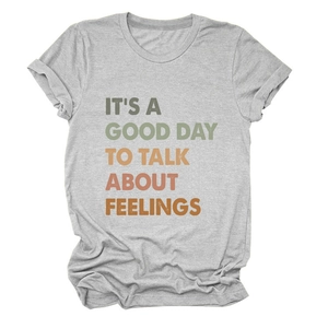 Detail of grey cotton T-shirt featuring It's a Good Day to Talk About Feelings slogan
