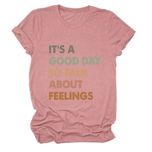 Detail of dusty rose T-shirt with 'IT'S A GOOD DAY TO TALK ABOUT FEELINGS' print