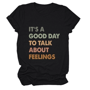 Detail of retro text print on black cotton t-shirt with high quality knit texture