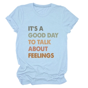 Light blue crewneck t-shirt with retro 'It's a good day' graphic print for women
