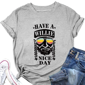 Close-up of gray cotton t-shirt featuring Willie Nelson portrait and text print
