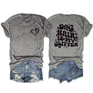 Flat lay of gray t-shirt with Dog Hair Is My Glitter print and denim shorts set