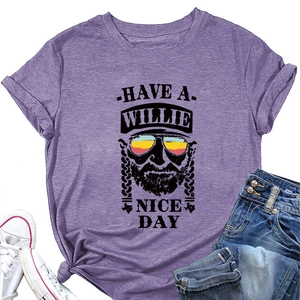 Detail of purple short sleeve t-shirt with Willie portrait and rainbow sunglasses print