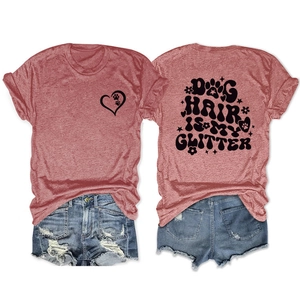 Flat lay of dog hair is my glitter t-shirt and ripped denim shorts with back print detail