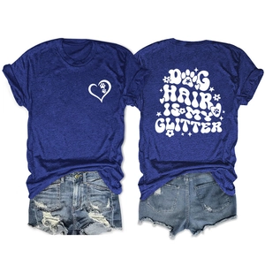 Detail of navy blue t-shirt with Dog Hair Is My Glitter print and paw heart motif