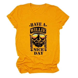 Detail showing high-quality cotton fabric and Willie Nelson graphic print on yellow t-shirt