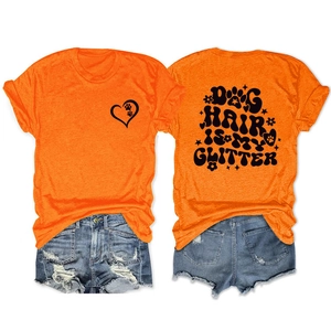 Front and back detail of an orange cotton T-shirt with Dog Hair Is My Glitter print