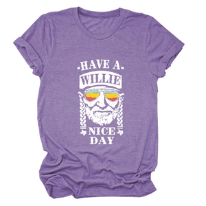 Close-up of vintage Willie Nelson print on heather purple cotton t-shirt fabric
