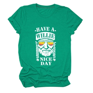 Detail of green heather t-shirt featuring Willie Nelson graphic and Have a Willie Nice Day text