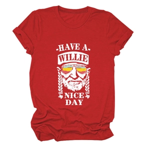 Macro detail of red cotton T-shirt featuring Willie Nelson portrait and slogan print