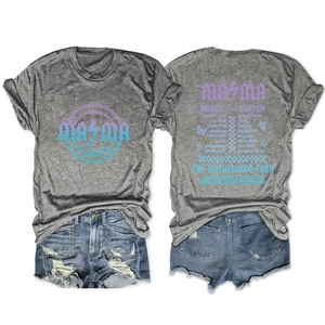 Flat lay of gray T-shirt with vintage purple MAMA graphics and denim shorts