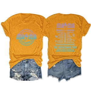 Detail of mama makes it all happen print on mustard yellow cotton t-shirt for women