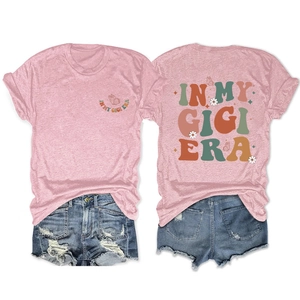 Pink In My Gigi Era t-shirt featuring butterfly graphics and distressed denim shorts