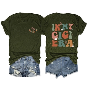 Detail of In My Gigi Era butterfly print on olive green t-shirt and denim shorts set