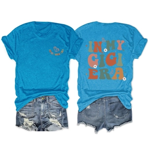 Detailed front and back view of blue T-shirt with IN MY GIGI ERA butterfly print