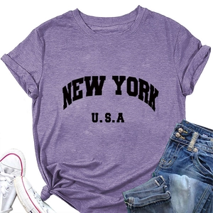 T-shirt violet New York USA en coton avec noeud à l'ourlet et manches à revers tendance