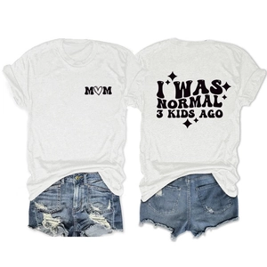Detail of 'I WAS NORMAL 3 KIDS AGO' back print on white cotton t-shirt and denim shorts