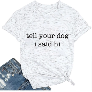 Detail of the cotton T-shirt with 'tell your dog i said hi' print and ripped denim shorts