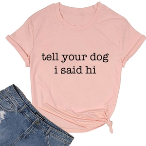 Pink cotton t-shirt detail showing the tell your dog i said hi text and knot hem