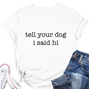 Detail of white cotton T-shirt with black tell your dog i said hi text and rolled sleeves