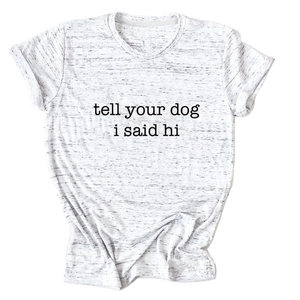 Detailed view of grey heather fabric and 'tell your dog i said hi' printed text on t-shirt