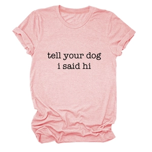 Close-up of pink cotton T-shirt showing round neck detail and rolled cuff sleeve