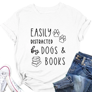 Flat lay of white cotton T-shirt with 'Easily Distracted by Dogs & Books' print