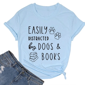Detail of light blue cotton T-shirt featuring 'Easily Distracted by Dogs & Books' graphic
