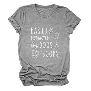 Detail of grey cotton T-shirt featuring white slogan Dogs and Books and paw print