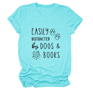 Close-up of sky blue cotton T-shirt featuring dogs and books graphic print details
