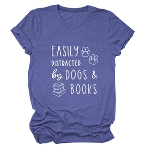 Close-up of Dogs & Books print on purple heathered cotton fabric t-shirt detail