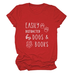Close-up of red cotton T-shirt featuring easily distracted by dogs and books print