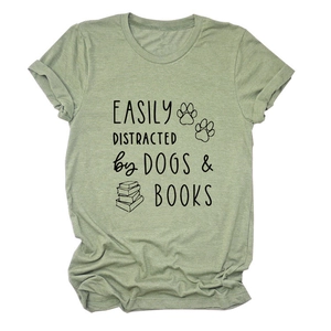 Detail of light green cotton t-shirt with black dog and book graphic print