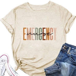 Flat lay of beige cotton T-shirt with EMERGENCY nurse print and denim styling