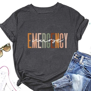 Flat lay of a grey Emergency Nurse t-shirt paired with denim shorts and casual sneakers