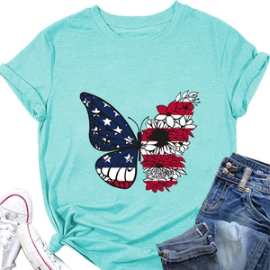 Detail of mint green T-shirt featuring a butterfly with American flag and floral wings