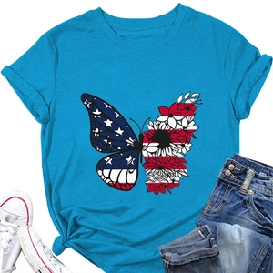 Detail of blue T-shirt featuring a butterfly print with US flag patterns and floral elements