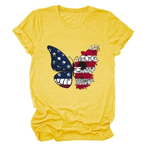 Detail of yellow T-shirt showing a butterfly print with flag stars and floral patterns