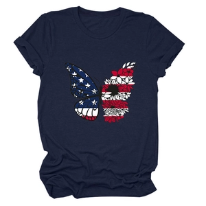 Detail of floral butterfly and American flag print on a navy blue short sleeve t-shirt