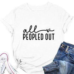 Flat lay of white cotton T-shirt featuring all PEOPLED OUT slogan with denim shorts