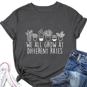 Detail of soft charcoal grey tee with white succulent print and motivational typography
