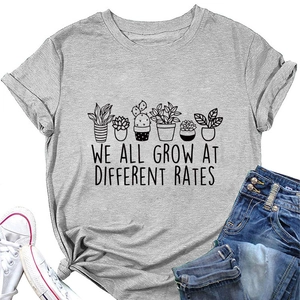Detail of grey cotton T-shirt featuring succulent plant print and inspirational quote