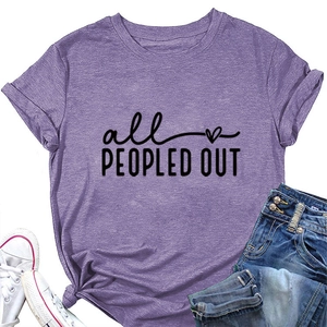 Flat lay of purple cotton T-shirt with all PEOPLED OUT text and blue denim jeans