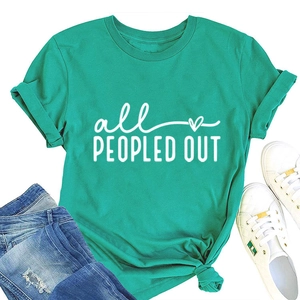 Flat lay of a teal crew neck T-shirt with 'all PEOPLED OUT' text and cuffed sleeves