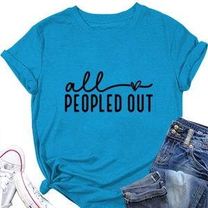 Flat lay of light blue crew neck T-shirt with 'all PEOPLED OUT' print and denim shorts