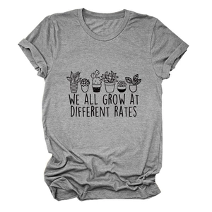 Detail of grey cotton T-shirt featuring potted plants and motivational text print
